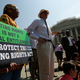 Supporters of the Voting Rights Act listen to speakers discussing the court’s rulings outside the U.S. Supreme Court Building on June 25, 2013, in Washington, D.C. (Win McNamee/Getty Images)